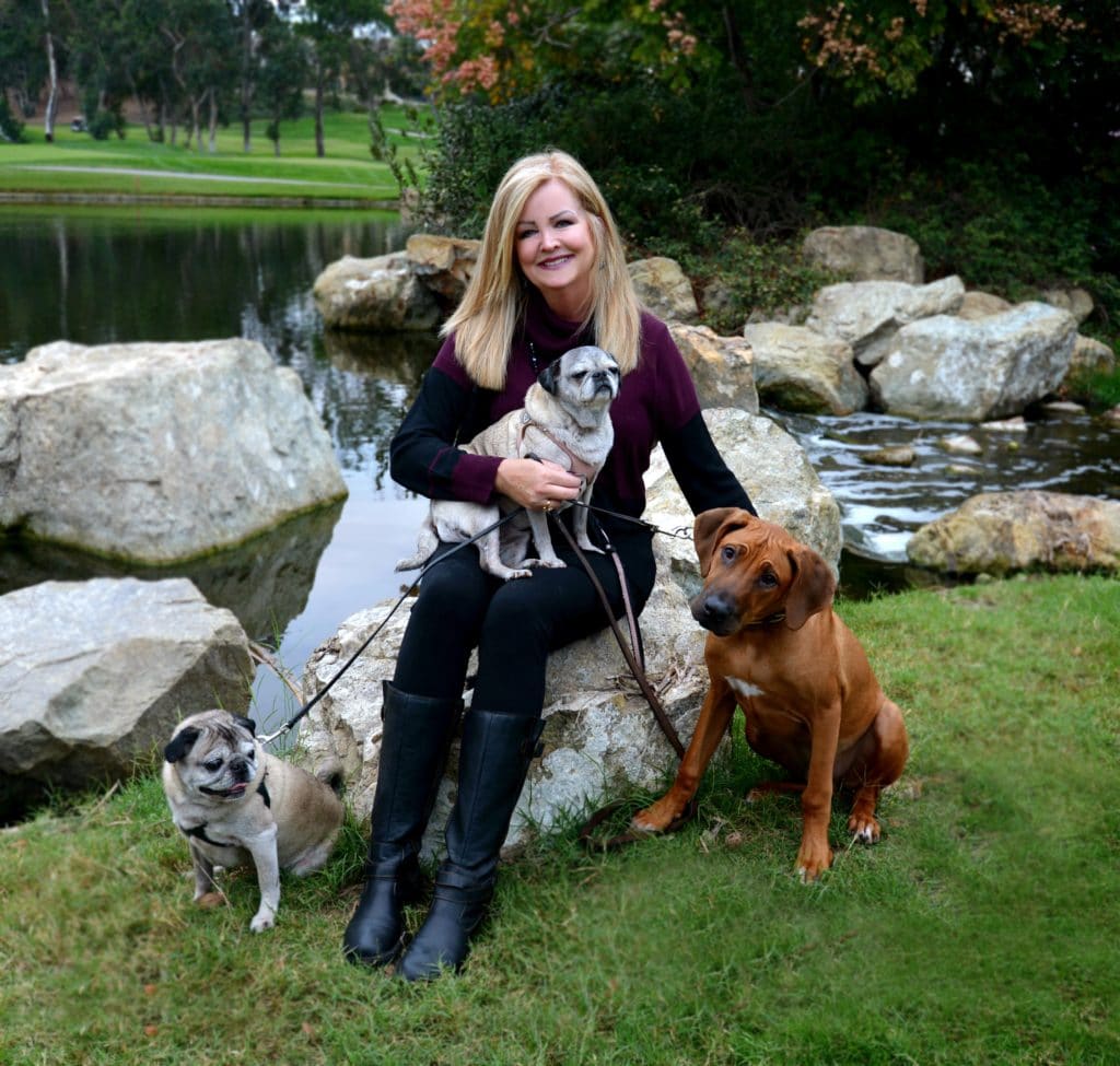 Carrie with dogs at Divine Canine Pet Sitting